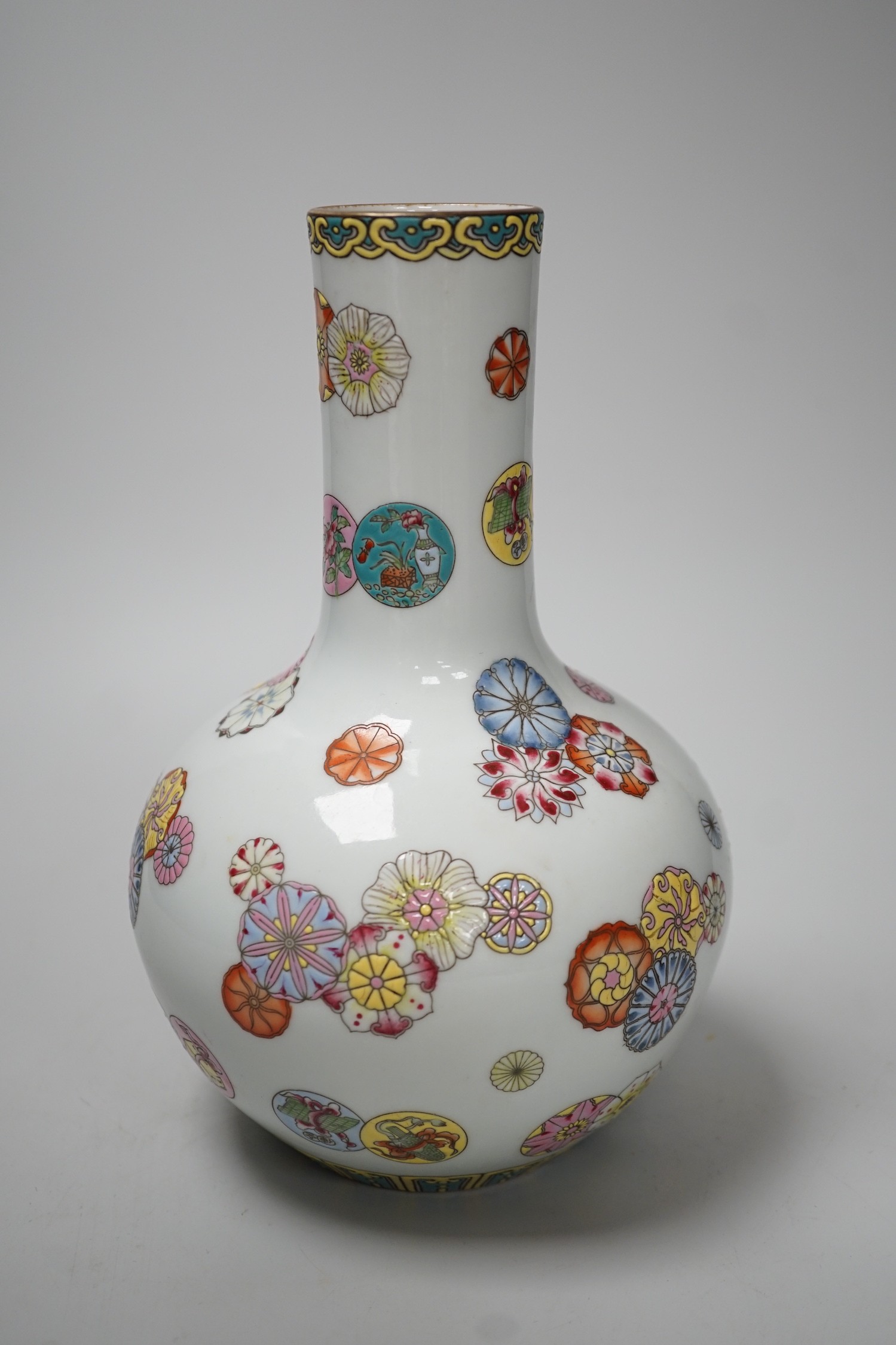A Chinese famille rose bottle vase, 23cm